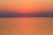 The Etosha Pan is usually dry clay and salt. This is a rare evening when it shimmered after heavy rains.